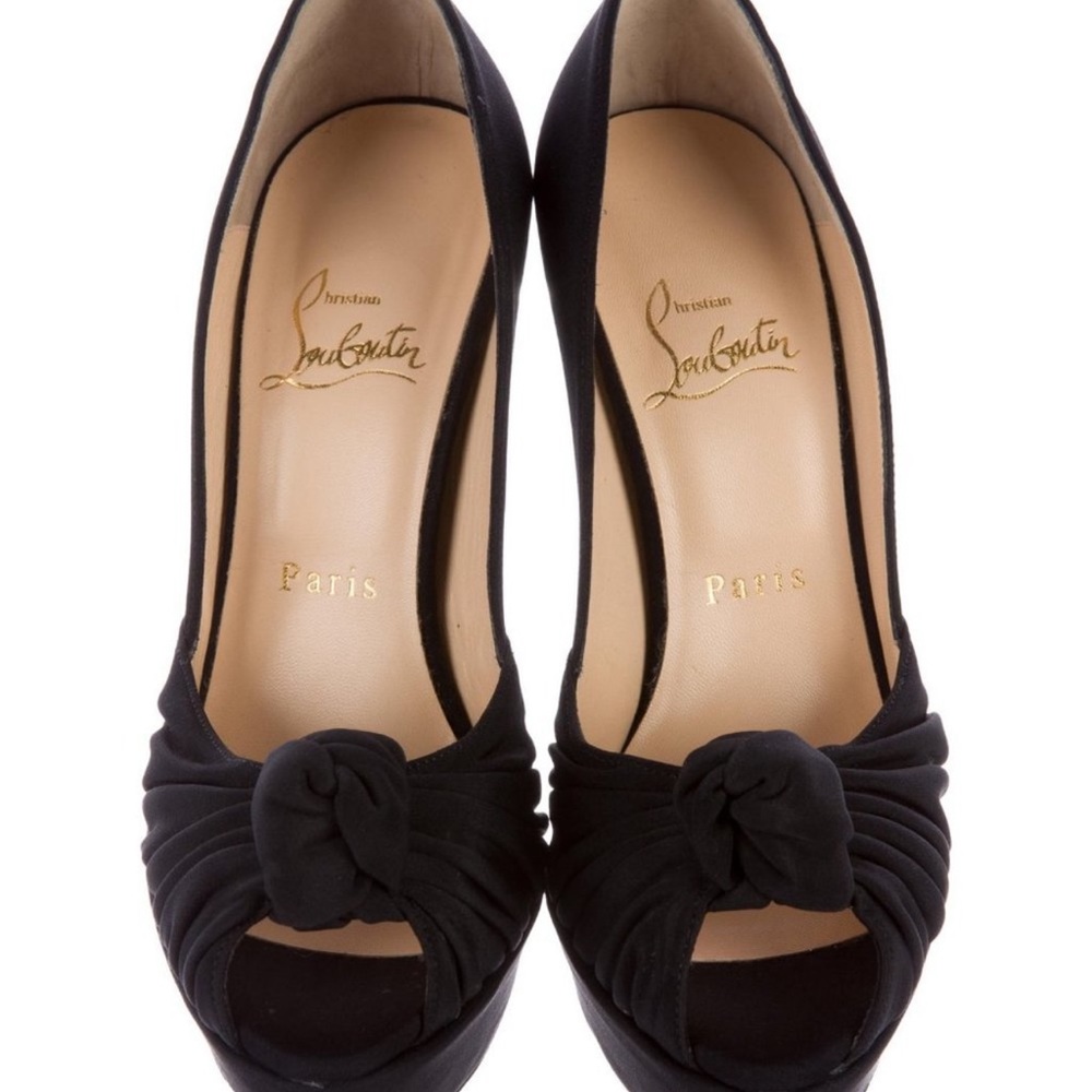 Christian Louboutin
Black Suede Jenny Knotted Platform 41 Pumps